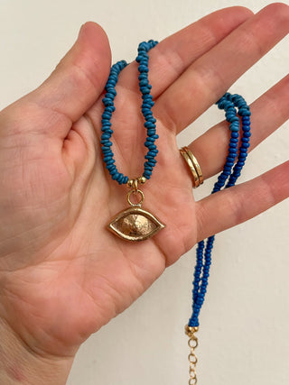 Solana Beaded Charm Necklace- Blue + Bronze Eye (19")