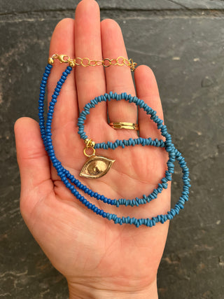 Solana Beaded Charm Necklace- Blue + Bronze Eye (19")