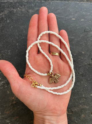 Solana Beaded Charm Necklace- White + Bronze Bird (18")