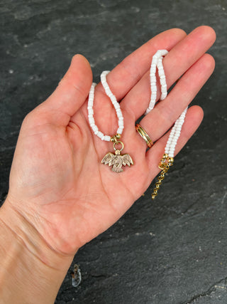Solana Beaded Charm Necklace- White + Bronze Bird (18")