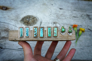 Held and Free Turquoise Bar Posts- II